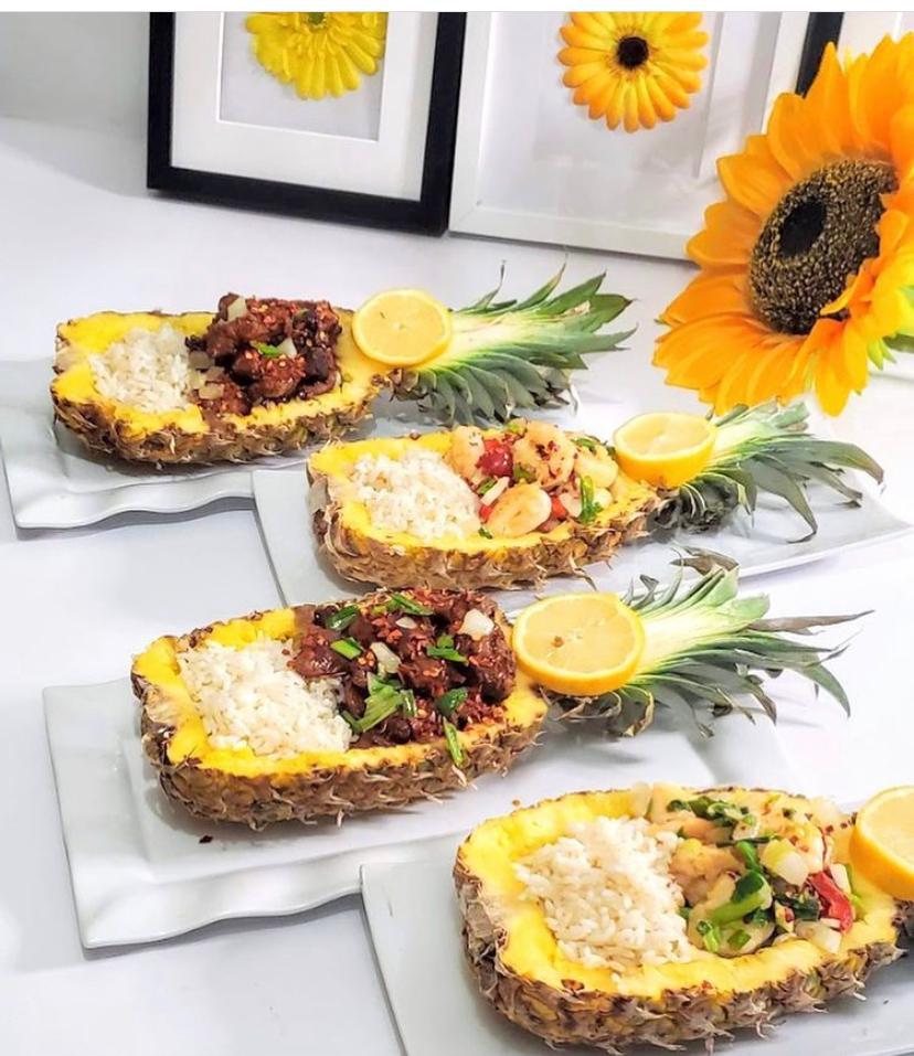 Pineapple bowls with rice and stew