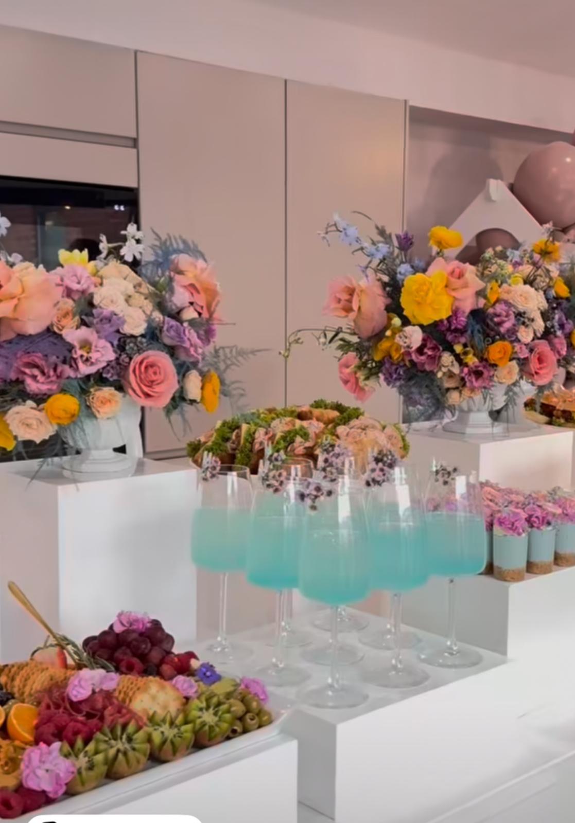 Floral grazing table with cocktails